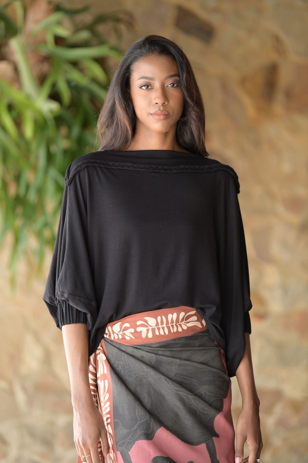 Blusa con caída y trenza hecha a mano